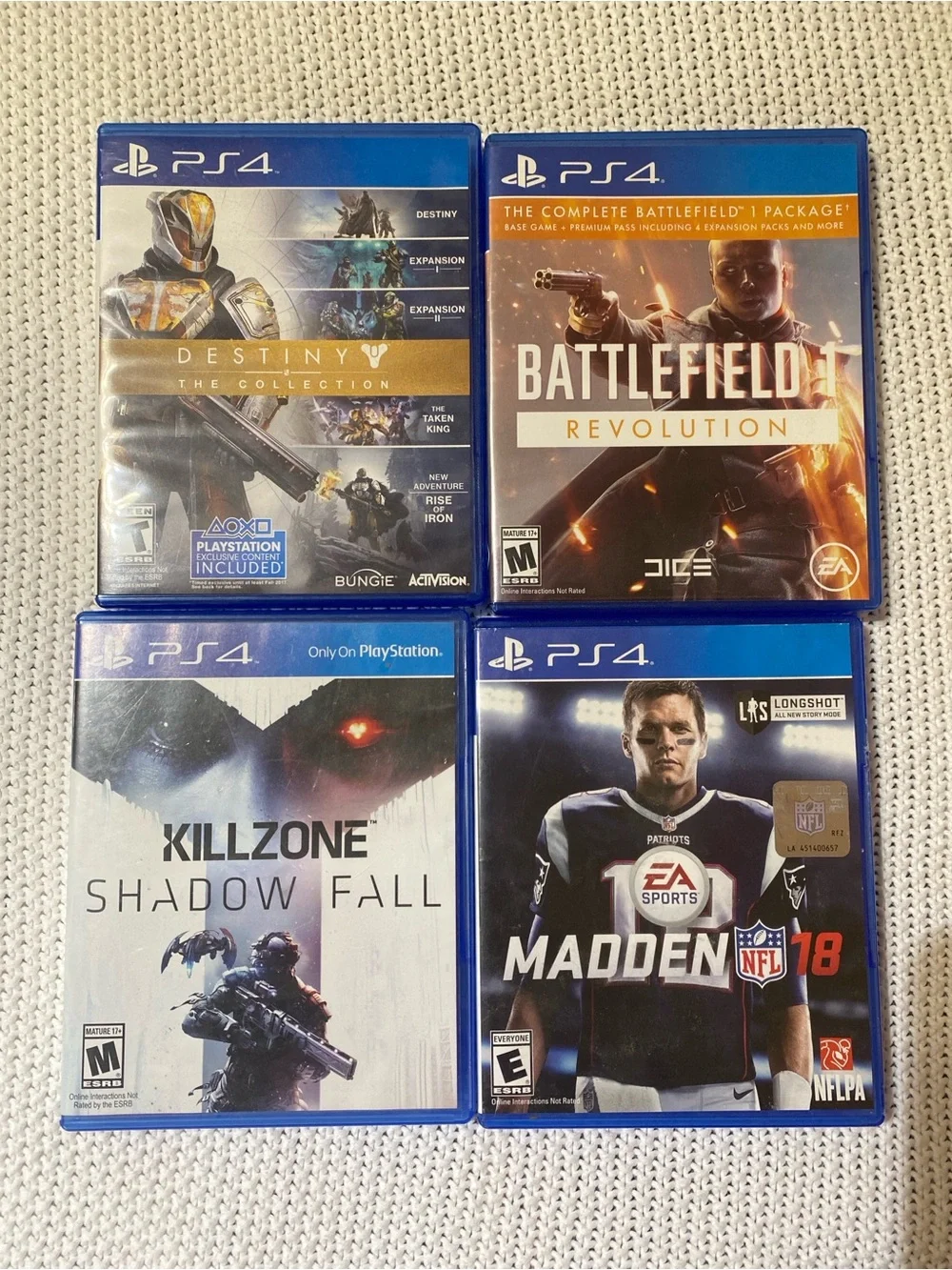 Sony PS4 Game Bundle - Blue Cases with Destiny, Battlefield, Killzone, Madden